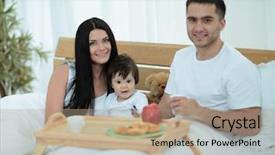  Presentation with home black family - Colorful PPT layouts enhanced with early childhood nutrition - family having breakfast in bed backdrop and a  colored foreground