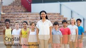  Presentation with school children - Cool new presentation theme with early education - portrait of happy female teacher backdrop and a coral colored foreground