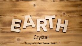  Presentation with wooden building blocks - PPT theme consisting of earth word made with building background and a coral colored foreground