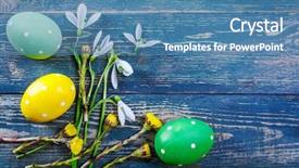  Presentation with snowdrop - Audience pleasing PPT theme consisting of easter eggs and spring flower snowdrop on old wooden blue board ustic style top view copyspace greeting card backdrop and a teal colored foreground