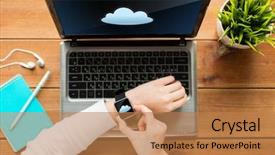  Presentation with cloud technology - PPT theme having education business people computing and technology concept - close up of woman with smart watch and laptop computer on wooden table with cloud icon on screens background and a coral colored foreground