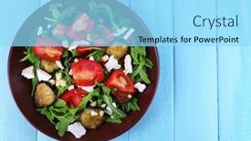  Presentation with eggplant - PPT theme consisting of eggplant salad with tomatoes arugula and feta cheese on wooden background background and a arctic colored foreground