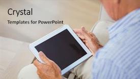  Presentation with using digital tablet - Slides having elderly computer - senior man sitting on sofa background and a soft green colored foreground