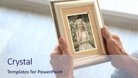  Presentation with picture frame - Audience pleasing PPT layouts consisting of elderly man holding photo frame backdrop and a sky blue colored foreground