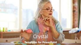  Presentation with elderly woman in nursing - Beautiful PPT theme featuring elderly woman painting easter eggs before holiday backdrop and a coral colored foreground