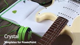  Presentation with note book - Slide deck enhanced with electric guitar with green headphones and note book on wooden background background and a tawny brown colored foreground