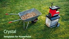  Presentation with shredder - Presentation enhanced with electric shredder mulcher with wheelbarrow background and a tawny brown colored foreground