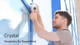  Presentation with video surveillance - Amazing PPT layouts having electrician fixing video surveillance camera backdrop and a light blue colored foreground