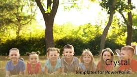  Presentation with happy kids - Slide deck enhanced with elementary free - happy kids lying on grass background and a coral colored foreground