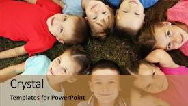  Presentation with children little child girl plays - PPT theme enhanced with elementary free - playful children lying on grass background and a gold colored foreground