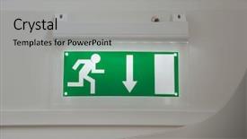  Presentation with emergency - PPT theme consisting of emergency exit sign glowing background and a light gray colored foreground