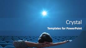 Presentation with cinema - Amazing PPT theme having empty-blue-cinema-with-person backdrop and a teal colored foreground