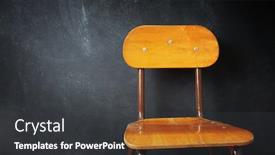  Presentation with chalkboard - Presentation theme having empty-wooden-school-chair-against background and a dark gray colored foreground