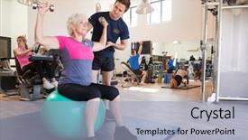  Presentation with gym ball - PPT theme featuring encouragement - senior woman exercising on swiss background and a light blue colored foreground