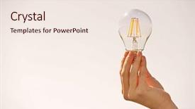  Presentation with trophy award hand holding - PPT theme enhanced with energy efficiency bulb - hand holding lamp on sky background and a sky blue colored foreground