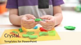  Presentation with playdough - Colorful theme enhanced with engagement model - little boy engaged in playdough backdrop and a yellow colored foreground