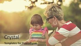  Presentation with displaying a happy mother cudd - PPT theme with enjoying free time using tablet background and a coral colored foreground