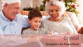  Presentation with grandparents day - Cool new slide deck with excited grandson sitting on sofa with grandparents opening presents on christmas day backdrop and a coral colored foreground