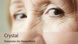  Presentation with deep - Theme having extreme close-up shot of deep dark brown eyes with wrinkles around them looking at camera background and a lemonade colored foreground