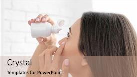  Presentation with iv infusion iv bottle - Theme consisting of eye drops - young woman with bottle background and a coral colored foreground