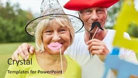  Presentation with fairy garden - Cool new PPT layouts with fairy garden - two seniors in colorful costumes backdrop and a yellow colored foreground