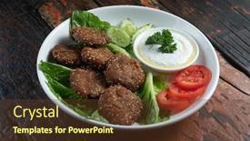  Presentation with vegan - Cool new theme with falafel vegan roasted chickpeas patties with garlic yogurt sauce isolated on rustic wooden table backdrop and a tawny brown colored foreground