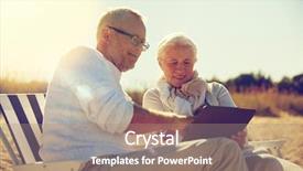  Presentation with family tourism - Theme consisting of family age travel tourism and people concept - happy senior couple with tablet pc computer resting in folding chairs on summer beach background and a coral colored foreground