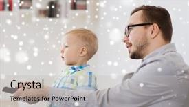  Presentation with remote - Theme featuring family childhood fatherhood technology and people concept - happy father and little son with remote control watching tv at home over snow background and a light gray colored foreground
