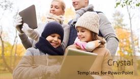  Presentation with computers - Amazing PPT theme having family childhood season technology and people concept - happy family with tablet pc computers in autumn park backdrop and a yellow colored foreground