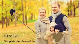  Presentation with childhood - Presentation theme consisting of family childhood season technology and people concept - happy family taking selfie with smartphone and monopod in autumn park background and a yellow colored foreground