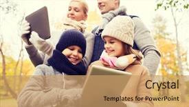  Presentation with computers - PPT theme having family childhood season technology and people concept - happy family with tablet pc computers in autumn park background and a coral colored foreground