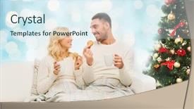  Presentation with blue lights - Theme featuring family christmas holidays love and people concept - happy couple covered with plaid drinking tea and sitting on sofa at home over blue lights background background and a sky blue colored foreground