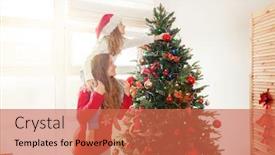  Presentation with child tree - Colorful presentation theme enhanced with family decoration christmas tree child with mother in christmas hat at home backdrop and a red colored foreground