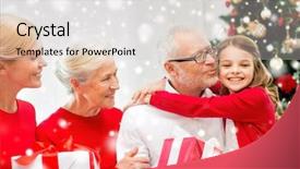  Presentation with generation - Amazing presentation theme having family holidays generation christmas and people concept - smiling family with gift boxes hugging and kissing at home backdrop and a light gray colored foreground