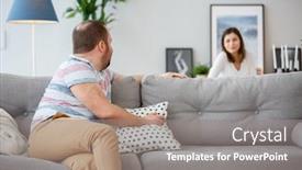  Presentation with family photo - Slide deck featuring family photo of man sitting back on couch and wife behind sofa background and a gray colored foreground