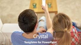  Presentation with remote - Slide set consisting of family relations and leisure concept - close up of couple with remote control watching tv together at home background and a tawny brown colored foreground