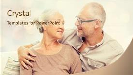  Presentation with happy holidays - Presentation design consisting of family relations love age and people concept - happy senior couple hugging and looking at each other on sofa over holidays lights background background and a lemonade colored foreground