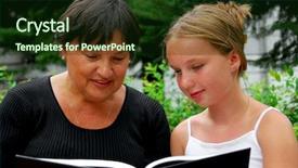  Presentation with family reading - Colorful PPT theme enhanced with family studies - grandmother and granddaughter reading backdrop and a tawny brown colored foreground