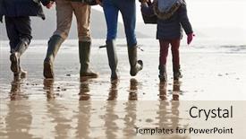  Presentation with holding hands family walking - Slides consisting of family walking along winter beach background and a soft green colored foreground