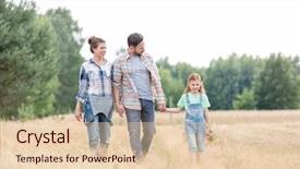  Presentation with field - Presentation theme having family walking on grassy field background and a  colored foreground