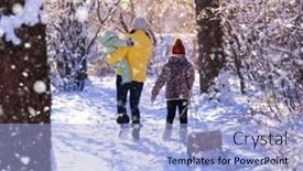  Presentation with winter family - PPT theme having family-walks-in-the-winter background and a light blue colored foreground