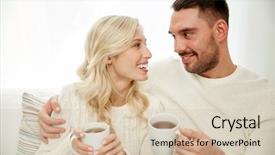  Presentation with winter family - Audience pleasing presentation theme consisting of family winter holidays love and people concept - happy couple with cups drinking tea and sitting on sofa at home backdrop and a soft green colored foreground