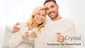  Presentation with winter family - Presentation theme consisting of family winter holidays love and people concept - happy couple covered by plaid with cups drinking tea and sitting on sofa at home background and a lemonade colored foreground