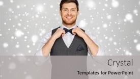  Presentation with happy holidays - Theme consisting of fashion style and holidays concept - happy man in festive suit dressing for party and adjusting bowtie over grey background and snow background and a light gray colored foreground