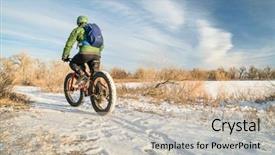  Presentation with mountain bike - Audience pleasing PPT layouts consisting of fat mountain bike in winter backdrop and a mint green colored foreground