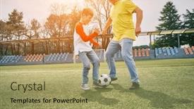  Presentation with dynamic - PPT theme enhanced with father-and-son-play-football background and a mint green colored foreground