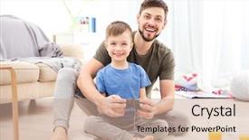  Presentation with silhouette of father and son - Cool new PPT theme with father and son playing videogame backdrop and a coral colored foreground