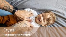  Presentation with father - Cool new presentation theme with father-tickling-his-little-son backdrop and a coral colored foreground