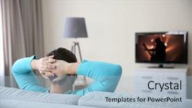  Presentation with home - Audience pleasing presentation consisting of favourite film - young handsome man watching tv backdrop and a light blue colored foreground