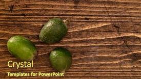  Presentation with fruits - PPT layouts enhanced with feijoa-fruits-lying-on-textured background and a tawny brown colored foreground